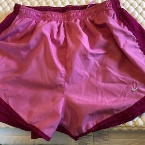 Nike running shorts pink, size small and in EUC.